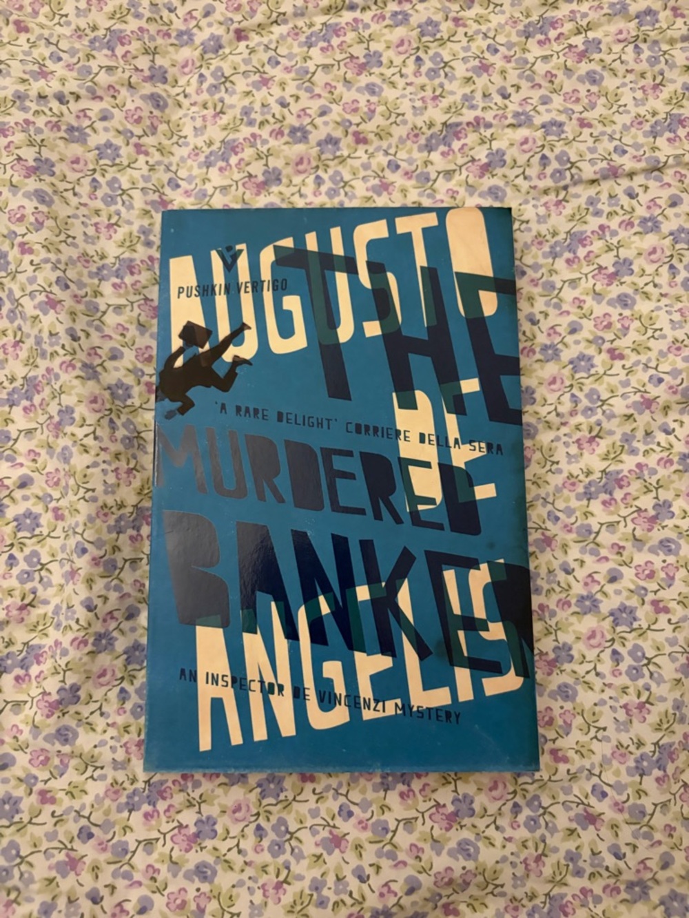 Agustina Bazterrica The Murdered Bankers Blue Paperback book